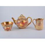 Royal Worcester three-piece teaset, still life painted with fruit, the teapot and cover 14.