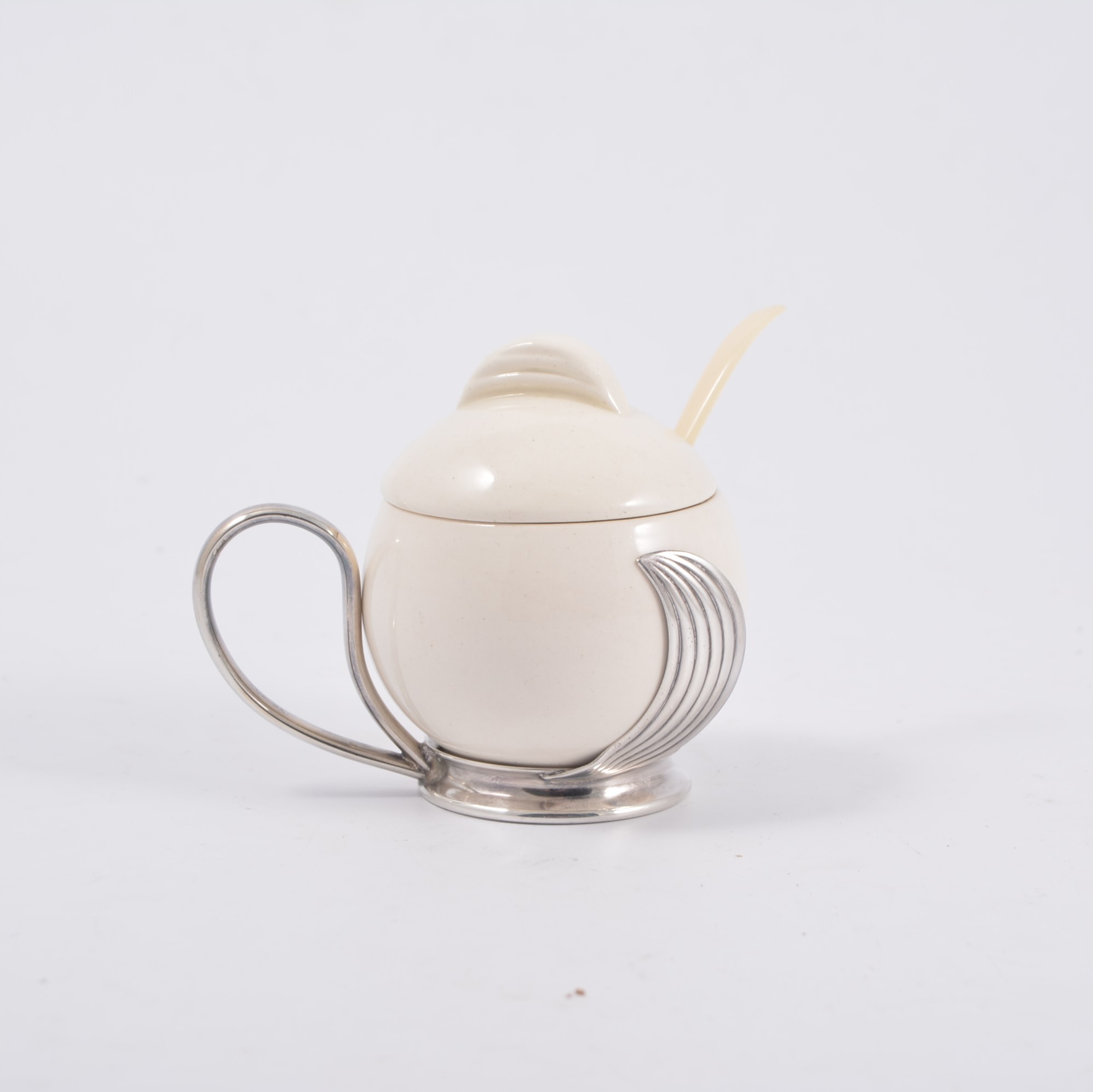 WMF, an Art Deco preserve pot, cream pottery body and cover in a stylised electroplated stand, 7.