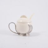 WMF, an Art Deco preserve pot, cream pottery body and cover in a stylised electroplated stand, 7.