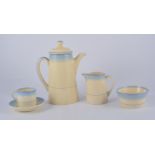 Royal Doulton, an Art Deco coffee set for six, painted with graduating blue bands,