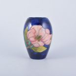 Walter Moorcroft, 'Magnolia' vase, circa 1985, swollen ovoid form, navy ground,
