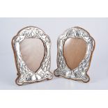 A pair of Art Nouveau silver photograph frames, by Henry Matthews,