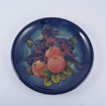 Sally Tuffin for Moorcroft, 'Finches' a plate, 1995, stamped Pottery marks, 26cm diam.