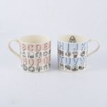 Eric Ravilious for Wedgwood, two Alphabet mugs, one pink colouway, the other blue colourway,