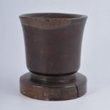 17th Century wooden mortar, turned and slightly flared form, on broad foot, 15.