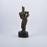 An abstract bronze statue of a queen holding a child, raised on a wooden base, indistincly signed,