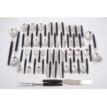 Tias Eckhoff for Lundtofte, a suite of Danish stainless steel cutlery, black plastic handles,