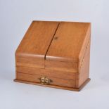 Golden oak stationery box.
