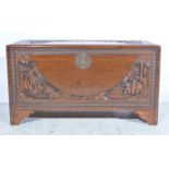 Carved camphor wood chest, Singapore, engraved brass lock, width 95cm, depth 47cm, height 52cm.