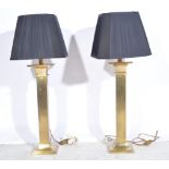 Pair of large brushed brass table lamps, square section columns, pleated back silk shades,