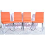 Set of four contemporary orange leather and chrome framed plated dining chairs,