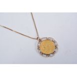 Half Sovereign Victoria Veiled Head 1901 in a 9 carat yellow gold scroll edge pendant mount on a 9