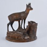 Black Forest style desk stand, carved with deer decoration.