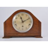 Oak mantel clock, striking movement.