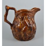 Nottingham type glazed stoneware jug, relief moulded, 26cm.