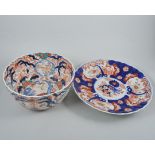 Japanese imari planter, circular moulded form, painted in blue and iron red,