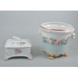 Berlin porcelain jardiniere, KPM painted floral decoration, moulded lion mask and on lion paw feet,