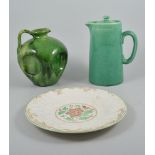 Barnstable lead glazed jug and a collection of plates,