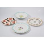 Four decorative plates, to include a Copeland plate decorated with thistles,