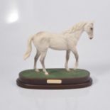 Royal Doulton, "Desert Orchid" horse figure, DA184, on oval wooden plinth,