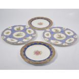 Pair of George Jones plates decorated with exotic birds, diameter 26cm,