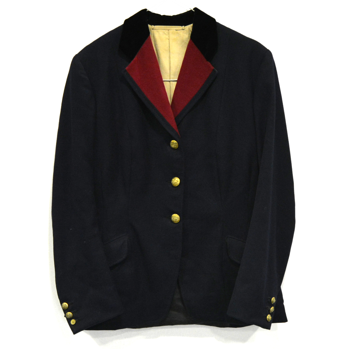 Blue hunting jacket, with buttons.