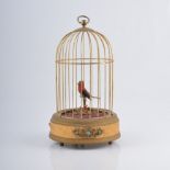 Singing bird Automaton in a cage, 27cm.