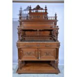 French oak dresser, the raised back with spindle gallery and a shelf with fluted columns,