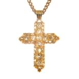 A diamond set cross pendant and chain,