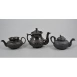 Basalt type silver shape teapot Robert Burns, 10cm and six others,