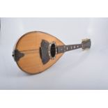 Italian mandolin, rosewood and mixed wood case with mother of pearl inlay,