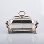 Regency style silver plated entree dish, rectangular form, raised on four feet,