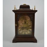 Reproduction stained wood bracket clock, arched brass dial, French cylinder movement,