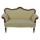 Walnut framed sofa, back with scroll outline and scrolled arms,