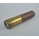 Brass and leather bound multi-draw telescope.