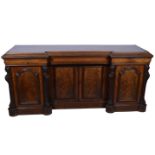 Large Victorian mahogany sideboard, inverted breakfront, carved scrolled pilaster, on plinth base,