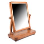 Victorian satin walnut toilet mirror, rectangular plate, platform base, width 45cm.