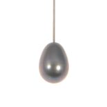 A black pearl pendant and chain, the single pear shaped pearl drop 8.5mm x 11.