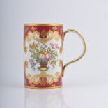Porcelain tankard, probably Continental, the field hand painted with floral bouquets,