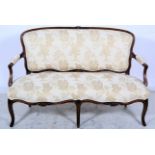 French Louis XV style walnut framed settee, cream damask style cotton upholstery, W142cm, H93cm.