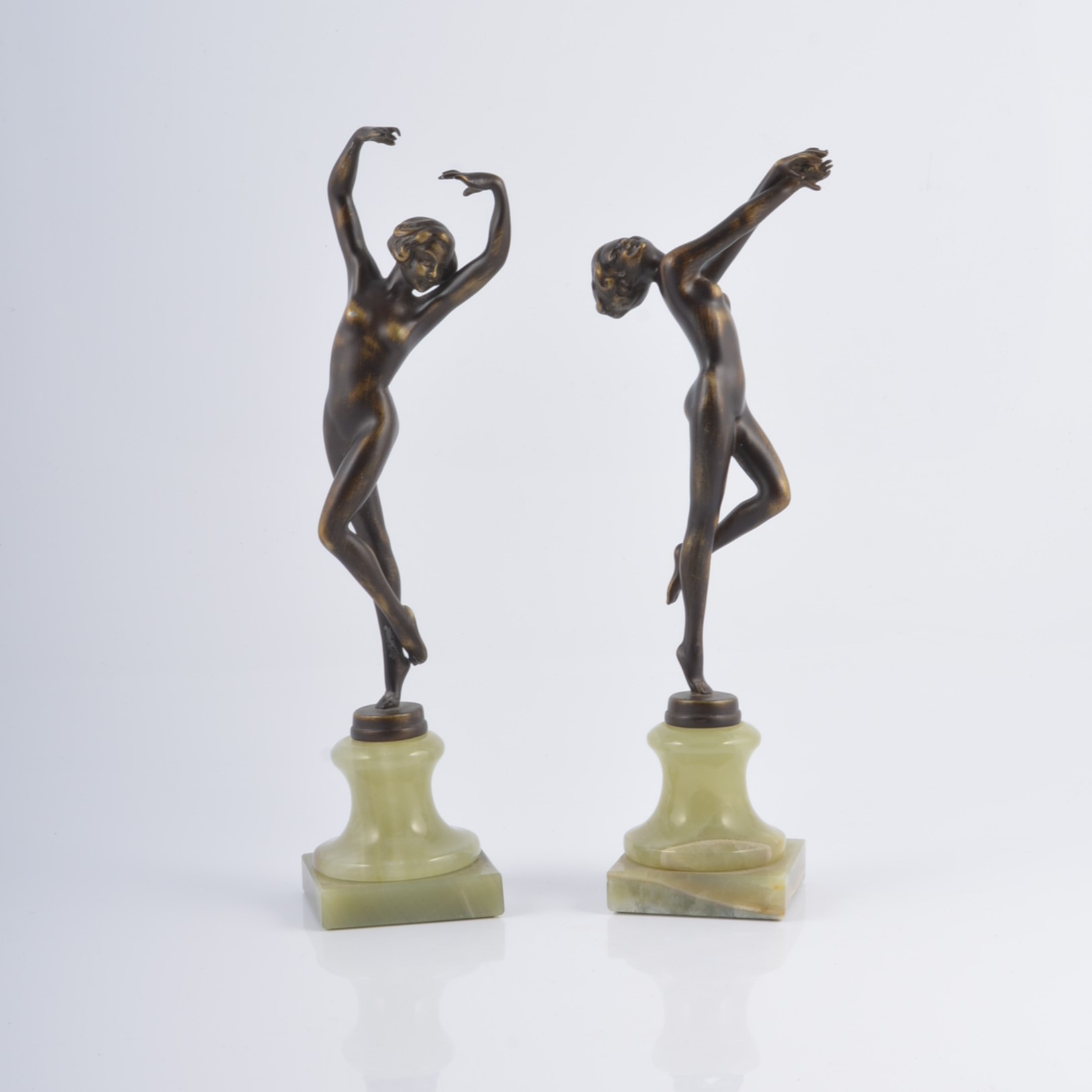 Two patinated spelter Art Deco figures, modelled in different dancing poses,