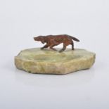 A green marble ashtray with cold painted model of a pointer, in the manner of Bergman, ashtray 14cm,