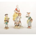 Three late Meissen figures, damaged,