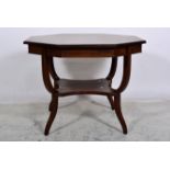 Large Victorian rosewood window table, octagonal top with a moulded edge, boxwood stringing,