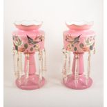 Pair of Victorian pink and opaque glass lustres, enamelled decoration with birds and flowers,