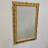 Parcel gilt and cream mirror, 79 x 54cm.