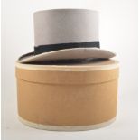 Two grey top hats, both in card boxes.