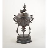 Patinated bronze Chinese censer with cover, on wooden plinth, height 39cm.