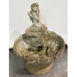 Composite stone shell shaped water bath surmounted with a figure of a mermaid,