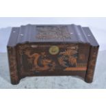 Camphor wood chest, (top split), carved figural panels, W101cm x D53cm x H56cm.